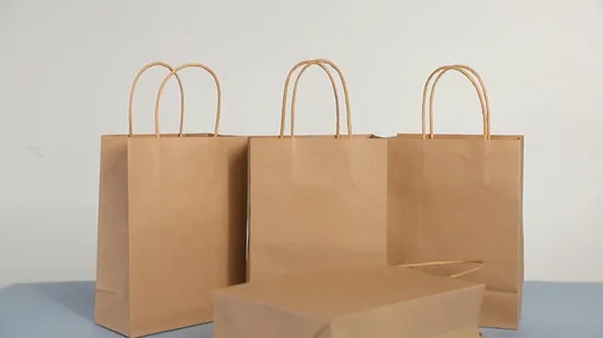 Piccole borse regalo marroni con manici per bomboniere per feste di compleanno